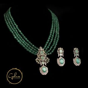 Antique finish pendant set with green quartz beads