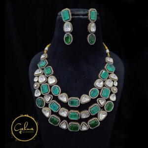 Victorian necklace set with emerald doublet and polki