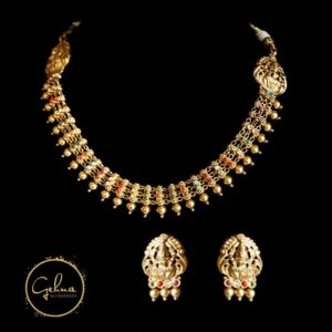 Golden temple necklace set with multi color stone