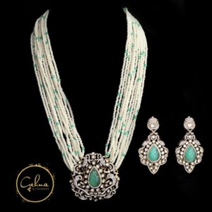 Seed pearl necklace set with antique finish sea green pendant