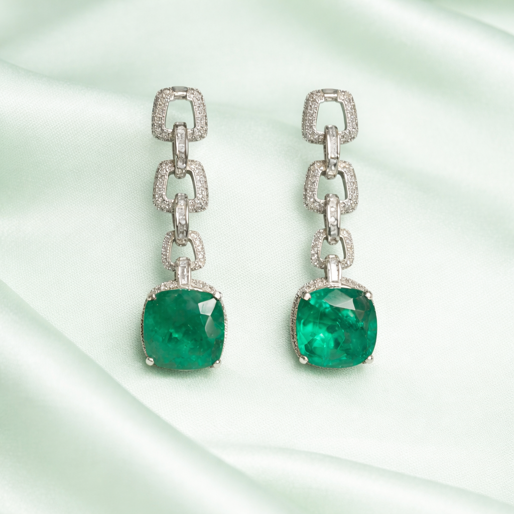 Designer earrings with emerald drops