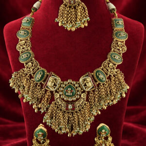 Traditional golden set with maang tika