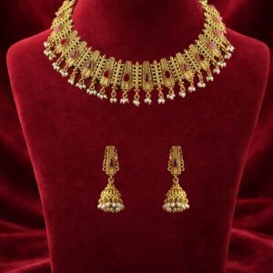 Copper gold necklace set with red stone